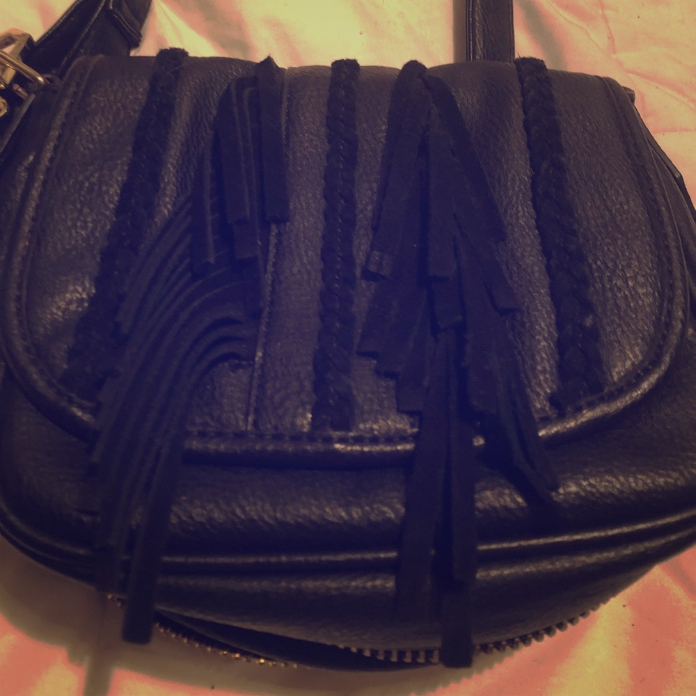 See Steve Madden black crossbody *gold details*